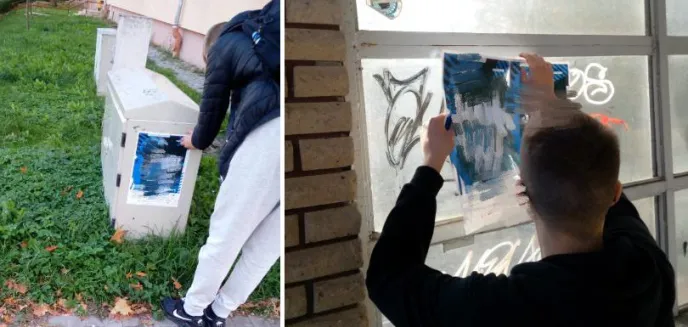 Dwóch młodych mężczyzn rozklejało plakaty zapraszające na mecz. Otrzymali mandaty