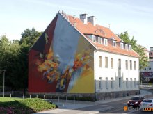 Ściana SP 6 w Olsztynie znów stała się „płótnem”. Artysta, Bartek Świątecki wrócił z nowym muralem [ZDJĘCIA, WIDEO]